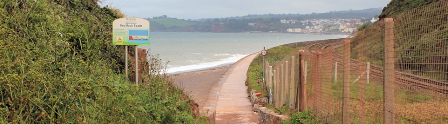 Red Rock Beach, looking towards Dawlish, Ruth walking round the coast in Devon