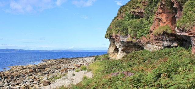 15 King's Cave, Ruth hiking the Arran Coastal Path