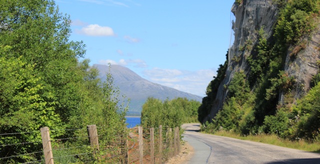 51 narrow road under cliffs, Ruth walking the shore of Loch Carron